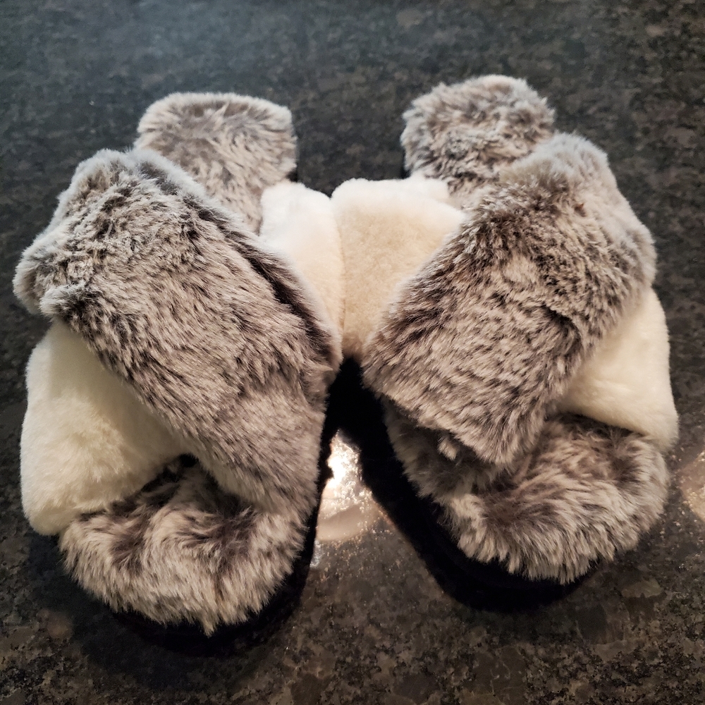 Brand new Furry crossover slippers. Small Size 5 to 6.5